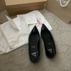 Christian Louboutin Black flats Elegant Design